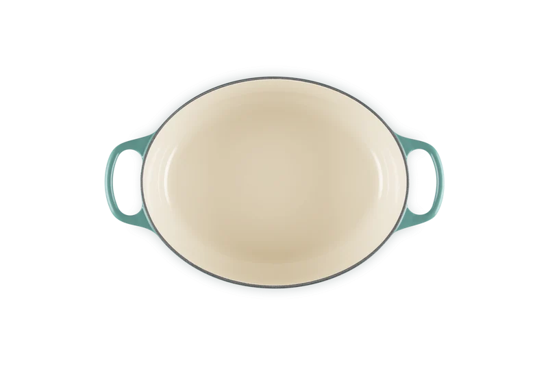 Le Creuset Oval Signature Schmorpfanne „Bleu Riviera“.