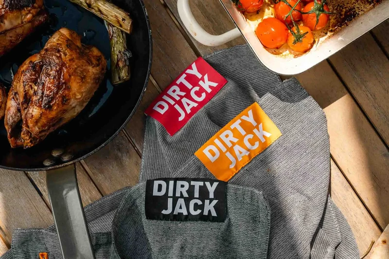 Dirty Jack Holzkohle-Kochtuch „Orange Label“