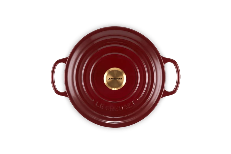 Le Creuset Signature Schmorpfanne „Granat“.