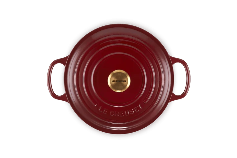 Le Creuset Signature Schmorpfanne „Granat“.