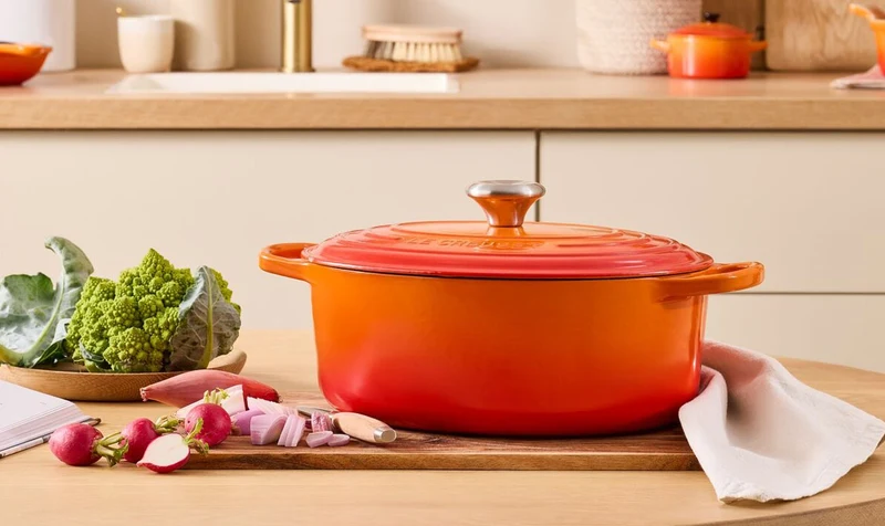 Le Creuset Oval Signature Schmorpfanne 'Orange Red'