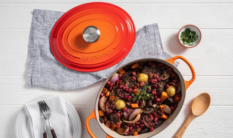 Le Creuset Oval Signature Schmorpfanne 'Orange Red'